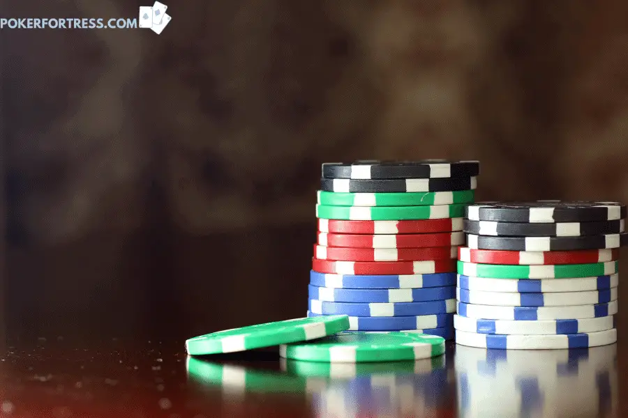 Different colors of poker chips for different values.