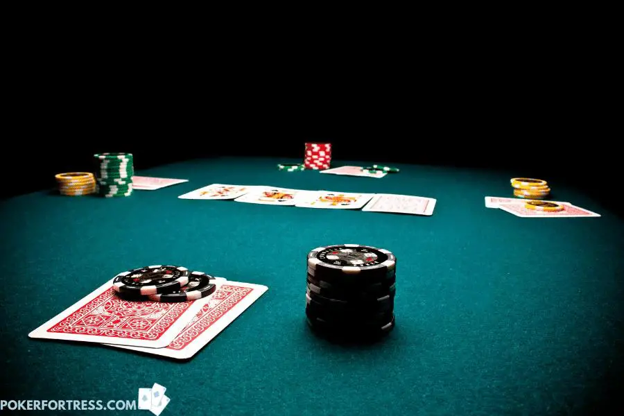 Why is it good to cap (put poker chips on) your hand (cards).